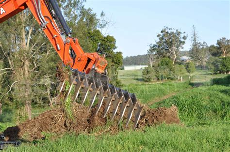 mini excavator rake attachments|homemade mini excavator attachments.